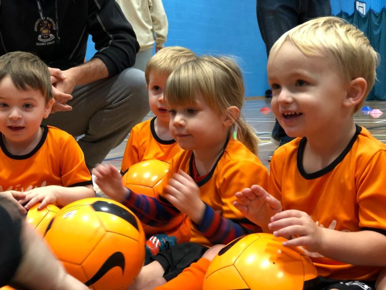 a group of children at Kixx football training