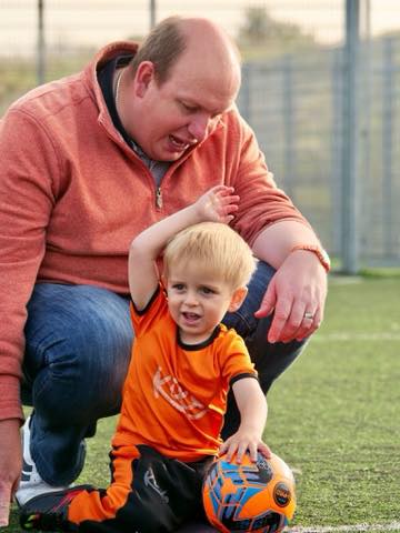 father and son at Kixx football lesson for preschool children