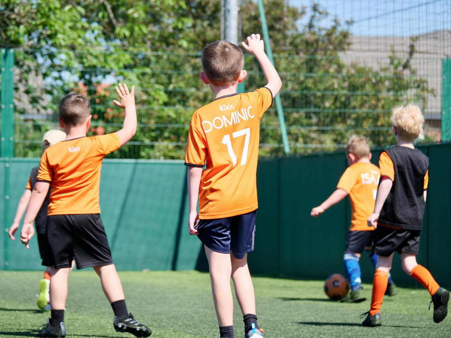 Image of team playing game for blog Skills We Teach In Our Football Lessons For 10 Year Olds