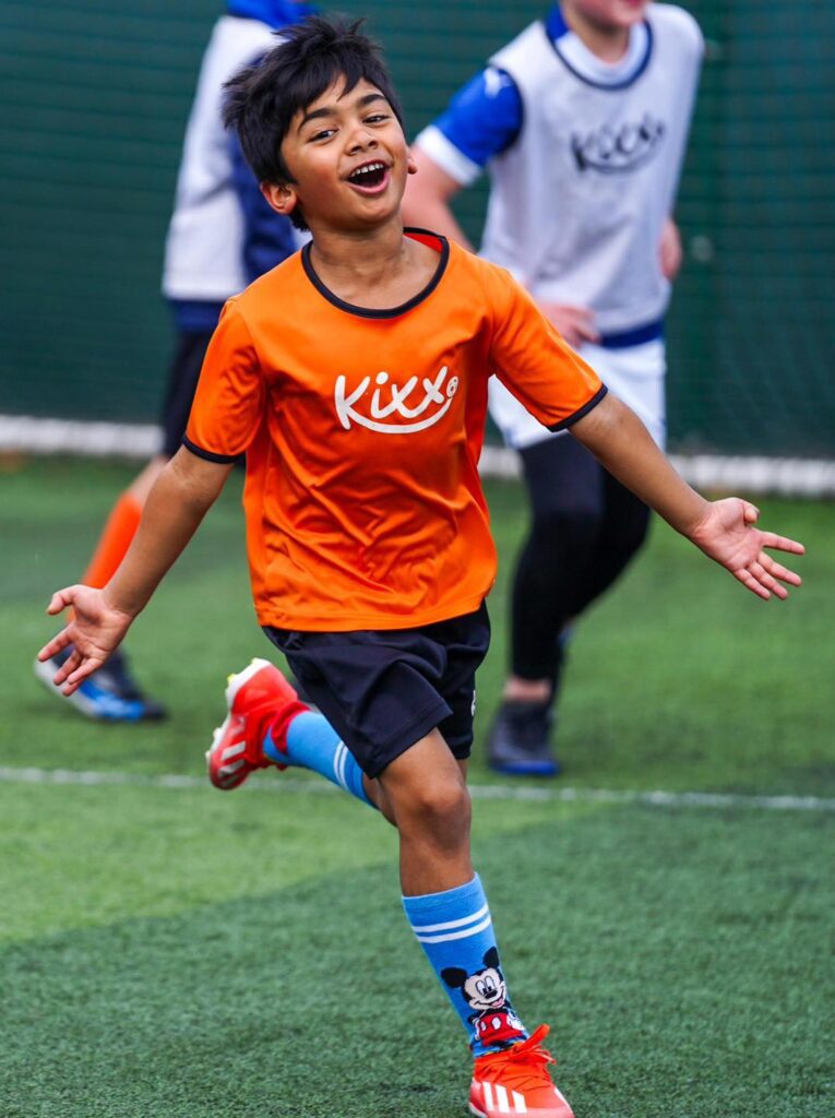 Image of boy after scoring a goal for the blog Is 10 Years Old Too Old To Start Football Classes? 