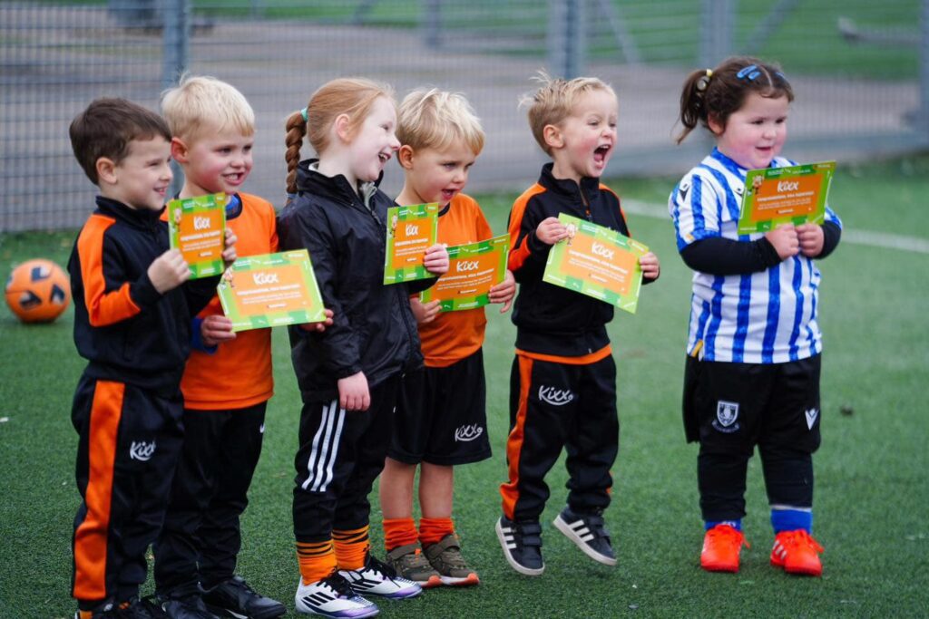 Image of award ceremony at Kixx for the blog The 3 Signs Your Infant Is Ready To Join Football Classes