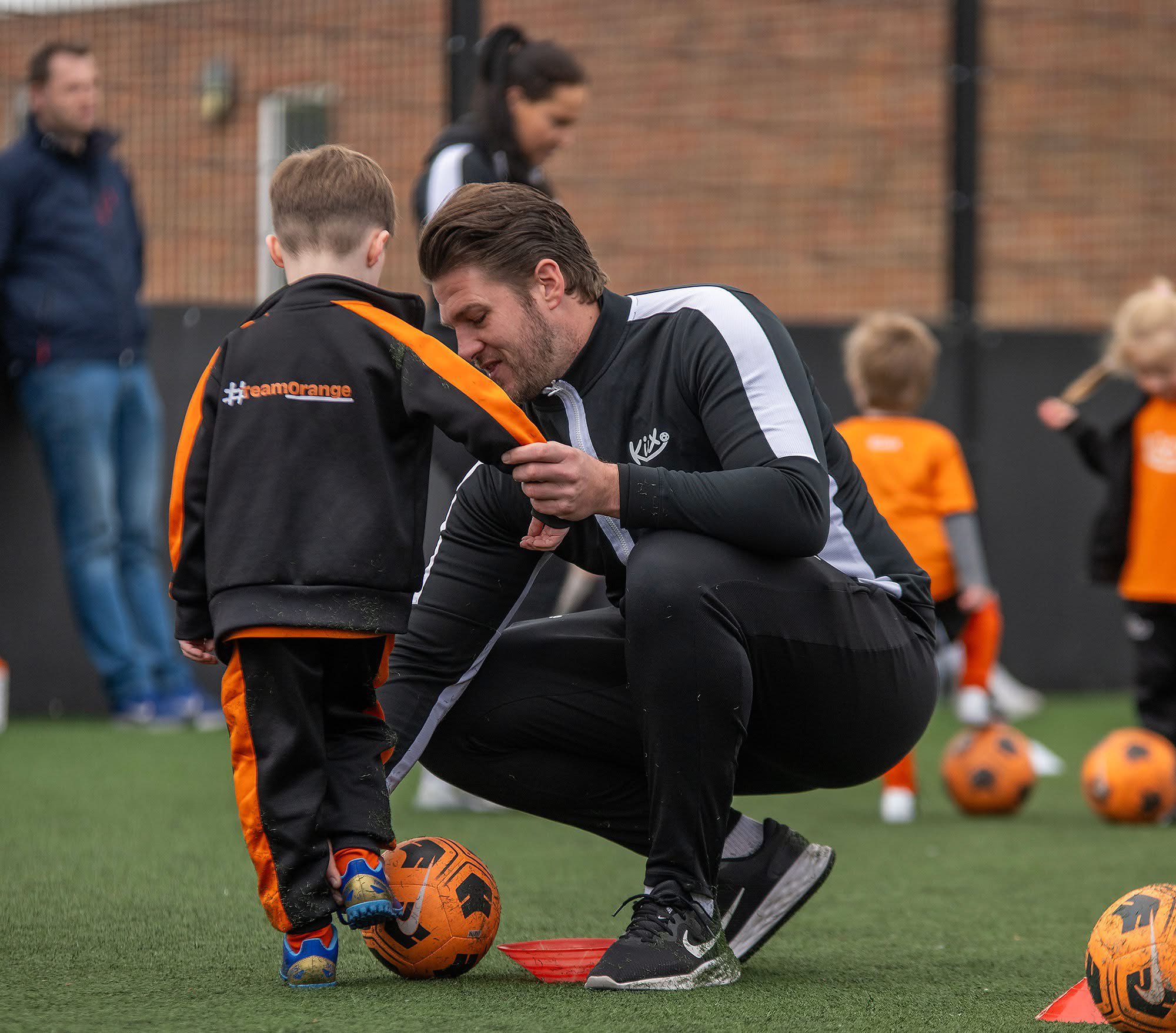 Image of Connor Chilvers working with child at Kixx Colchester