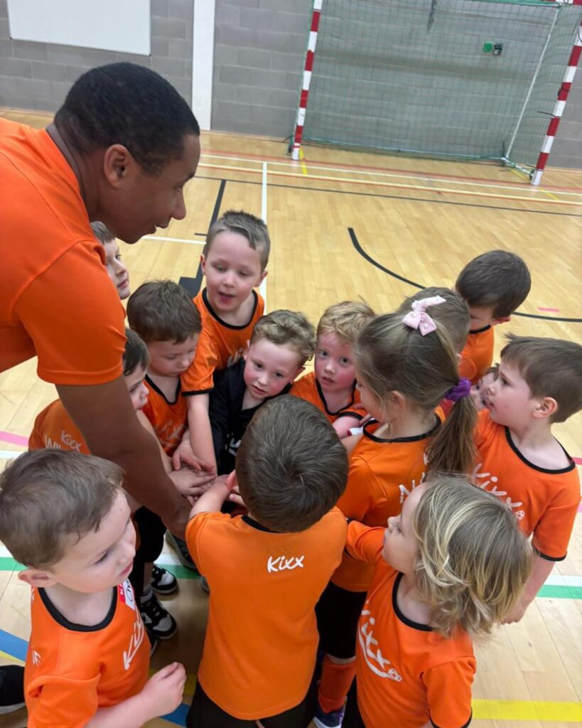 JD leading a Kixx football session in Newark.